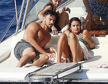 Lea Michele nipple slip in green bikini on a boat in Italy