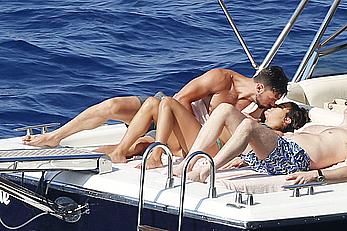 Lea Michele nipple slip in green bikini on a boat in Italy