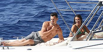 Lea Michele nipple slip in green bikini on a boat in Italy