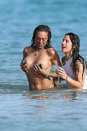 Lilly Becker goes topless at the beach during a sunshine break in Ibiza with friends