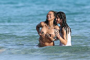 Lilly Becker goes topless at the beach during a sunshine break in Ibiza with friends