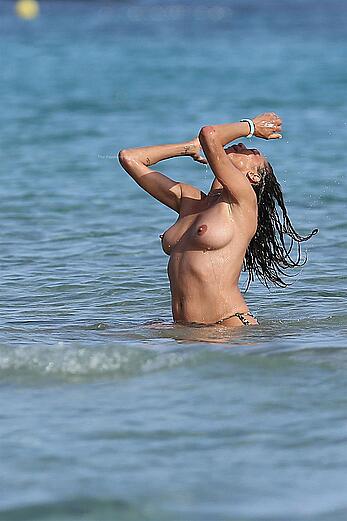 Lilly Becker goes topless at the beach during a sunshine break in Ibiza with friends