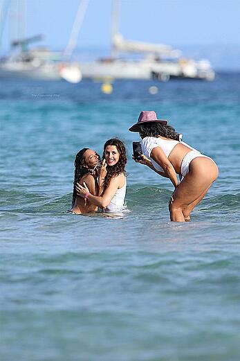 Lilly Becker goes topless at the beach during a sunshine break in Ibiza with friends