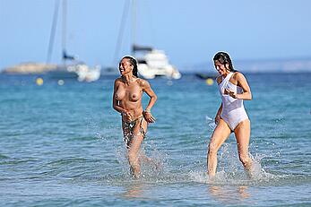 Lilly Becker goes topless at the beach during a sunshine break in Ibiza with friends