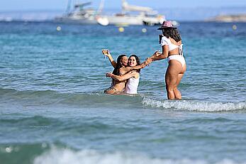 Lilly Becker goes topless at the beach during a sunshine break in Ibiza with friends