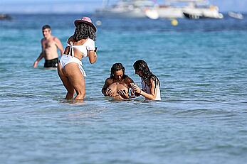 Lilly Becker goes topless at the beach during a sunshine break in Ibiza with friends