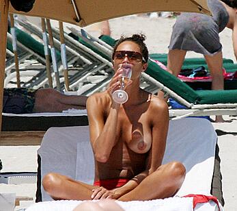 Lilly Becker topless on a beach paparazzi shots