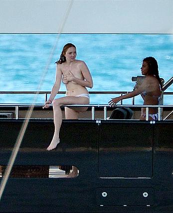 Lily Cole topless on a yacht in St. Barts