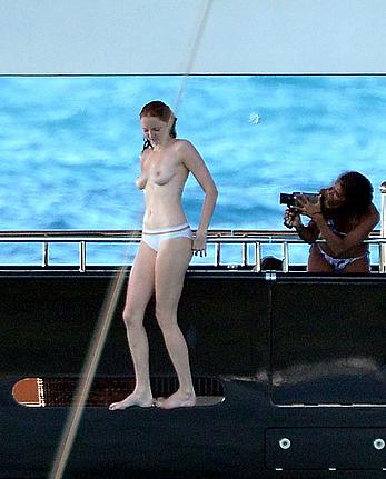 Lily Cole topless on a yacht in St. Barts