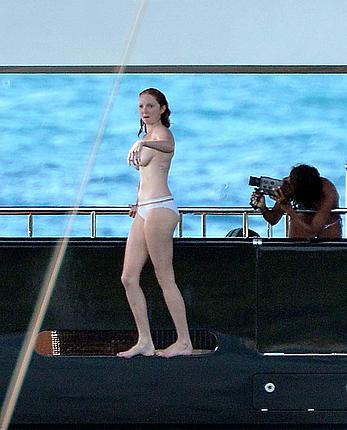 Lily Cole topless on a yacht in St. Barts