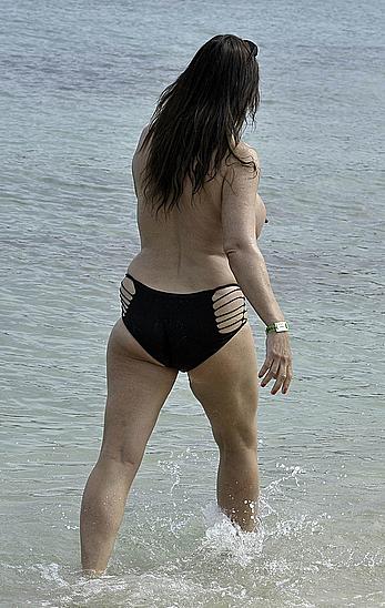 Busty Lisa Appleton topless on a beach in Spain