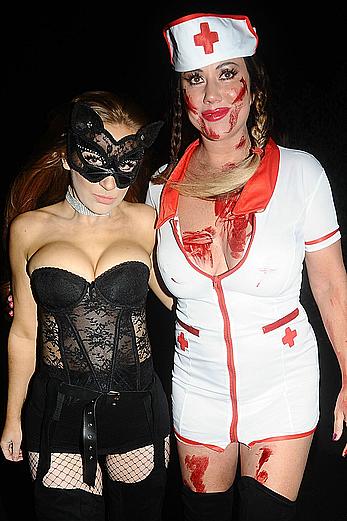 Lisa Appleton flashes her nude boobs in bloody nurse-costume at Halloween Party