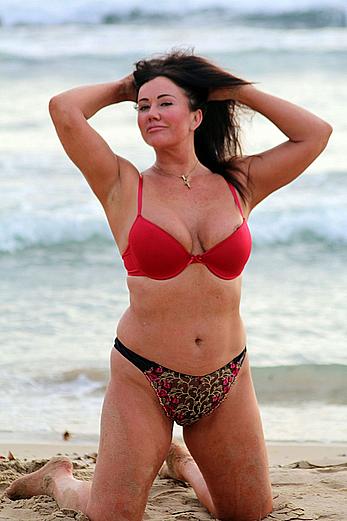 Reality star Lisa Appleton nipple slip on a beach in Spain