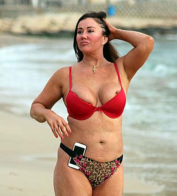 Reality star Lisa Appleton nipple slip on a beach in Spain