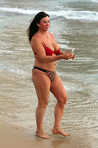 Reality star Lisa Appleton nipple slip on a beach in Spain