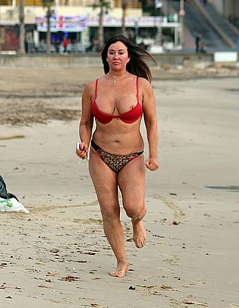 Reality star Lisa Appleton nipple slip on a beach in Spain