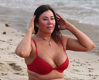 Reality star Lisa Appleton nipple slip on a beach in Spain