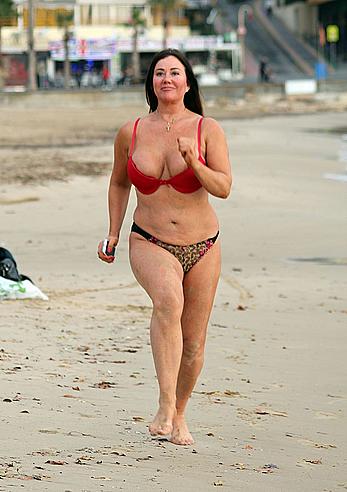 Reality star Lisa Appleton nipple slip on a beach in Spain