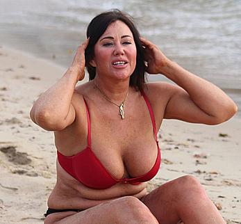 Reality star Lisa Appleton nipple slip on a beach in Spain