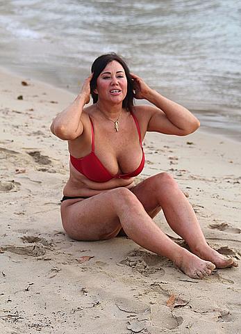 Reality star Lisa Appleton nipple slip on a beach in Spain