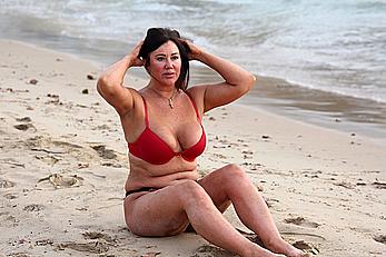 Reality star Lisa Appleton nipple slip on a beach in Spain