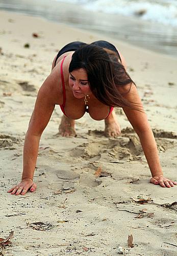 Reality star Lisa Appleton nipple slip on a beach in Spain