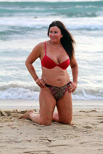 Reality star Lisa Appleton nipple slip on a beach in Spain