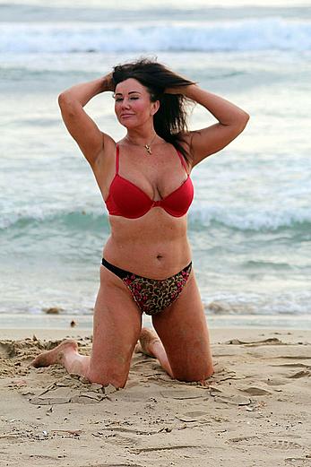 Reality star Lisa Appleton nipple slip on a beach in Spain