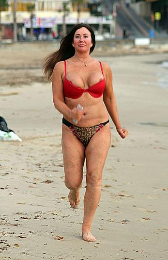 Reality star Lisa Appleton nipple slip on a beach in Spain