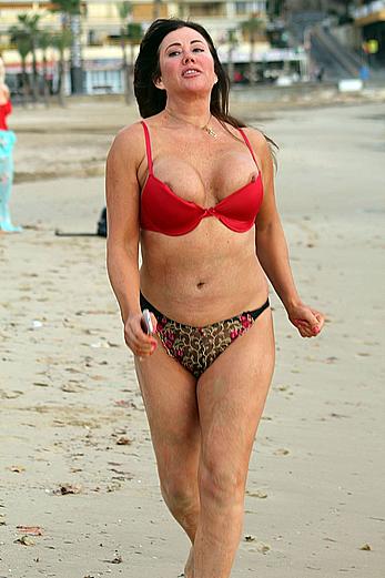 Reality star Lisa Appleton nipple slip on a beach in Spain