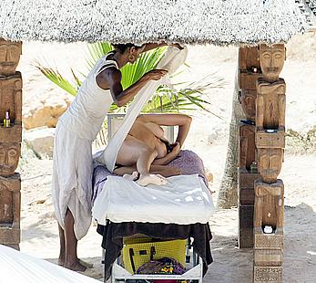 Lisa Snowdon on the beach in Ibiza boob peek