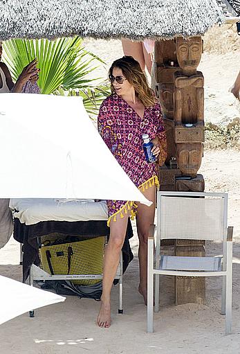 Lisa Snowdon on the beach in Ibiza boob peek