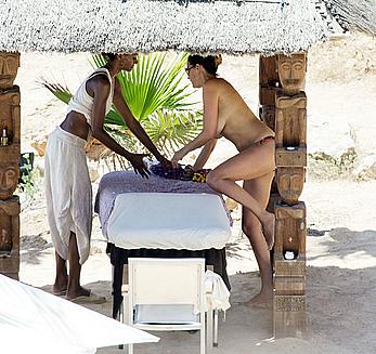 Lisa Snowdon on the beach in Ibiza boob peek