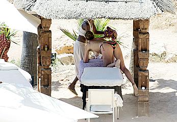 Lisa Snowdon on the beach in Ibiza boob peek