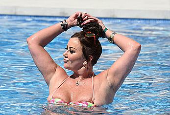 Lisa Appleton boobs out in a pool paparazzi shots