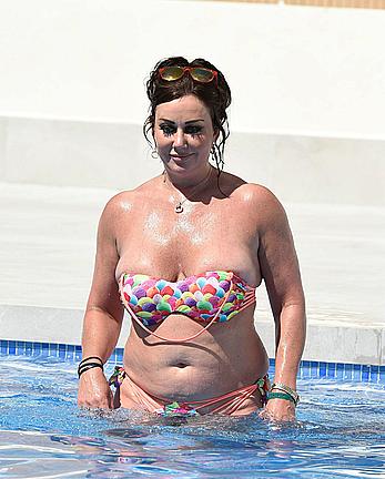 Lisa Appleton boobs out in a pool paparazzi shots