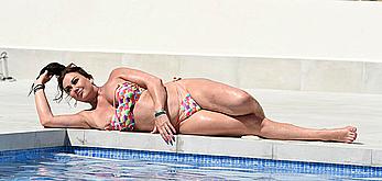 Lisa Appleton boobs out in a pool paparazzi shots