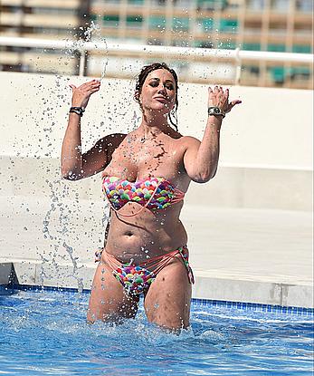 Lisa Appleton boobs out in a pool paparazzi shots