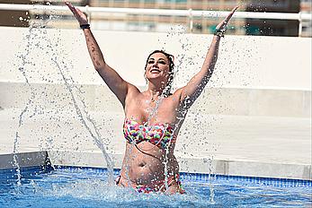 Lisa Appleton boobs out in a pool paparazzi shots