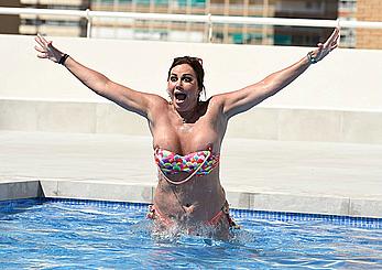 Lisa Appleton boobs out in a pool paparazzi shots