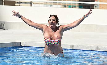 Lisa Appleton boobs out in a pool paparazzi shots