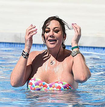 Lisa Appleton boobs out in a pool paparazzi shots