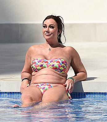 Lisa Appleton boobs out in a pool paparazzi shots