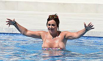 Lisa Appleton boobs out in a pool paparazzi shots