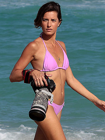 Logan Fazio in a purple bikini on Miami beach