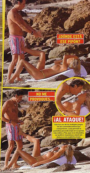 Lucia Lapiedra topless on a beach paparazzi shots