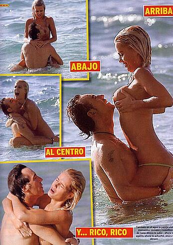 Lucia Lapiedra topless on a beach paparazzi shots