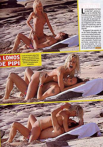 Lucia Lapiedra topless on a beach paparazzi shots