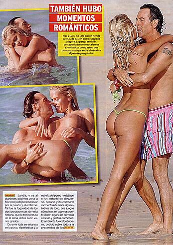 Lucia Lapiedra topless on a beach paparazzi shots