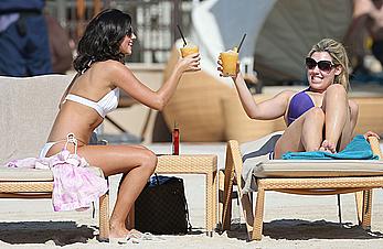 Lucy Mecklenburgh cameltoe and cleavage in white bikini